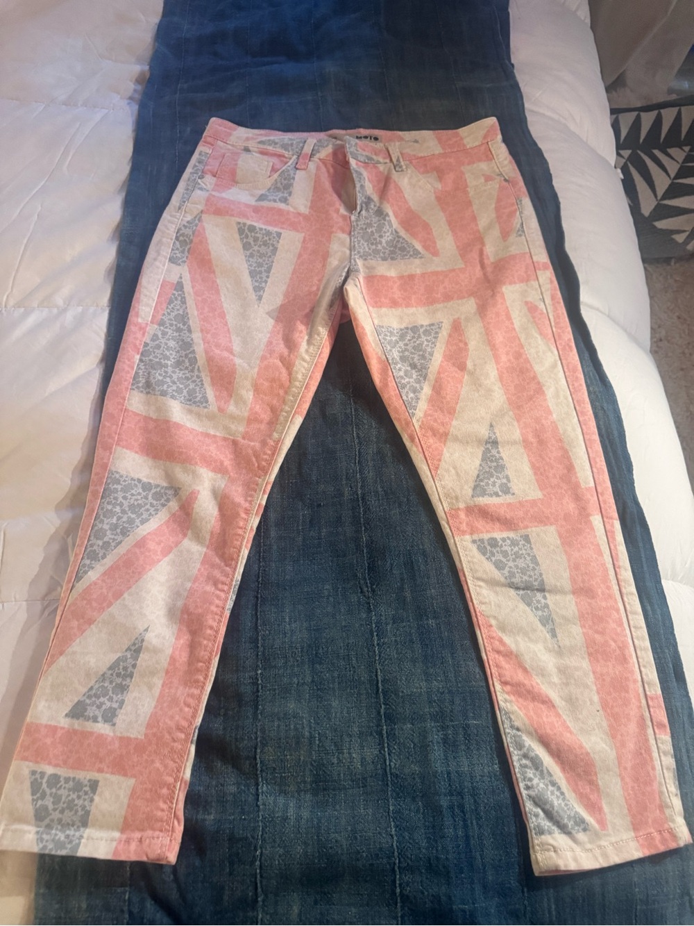 Women’s Patterned Skinny Jeans in faded red, white and blue.